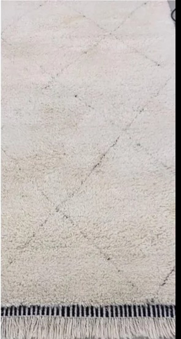 Le même tapis après injection-extraction, fibres claires et uniformes